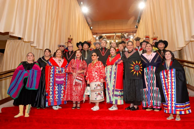 Osage Singers and Dancers arrive at the 96th Annual Academy Awards