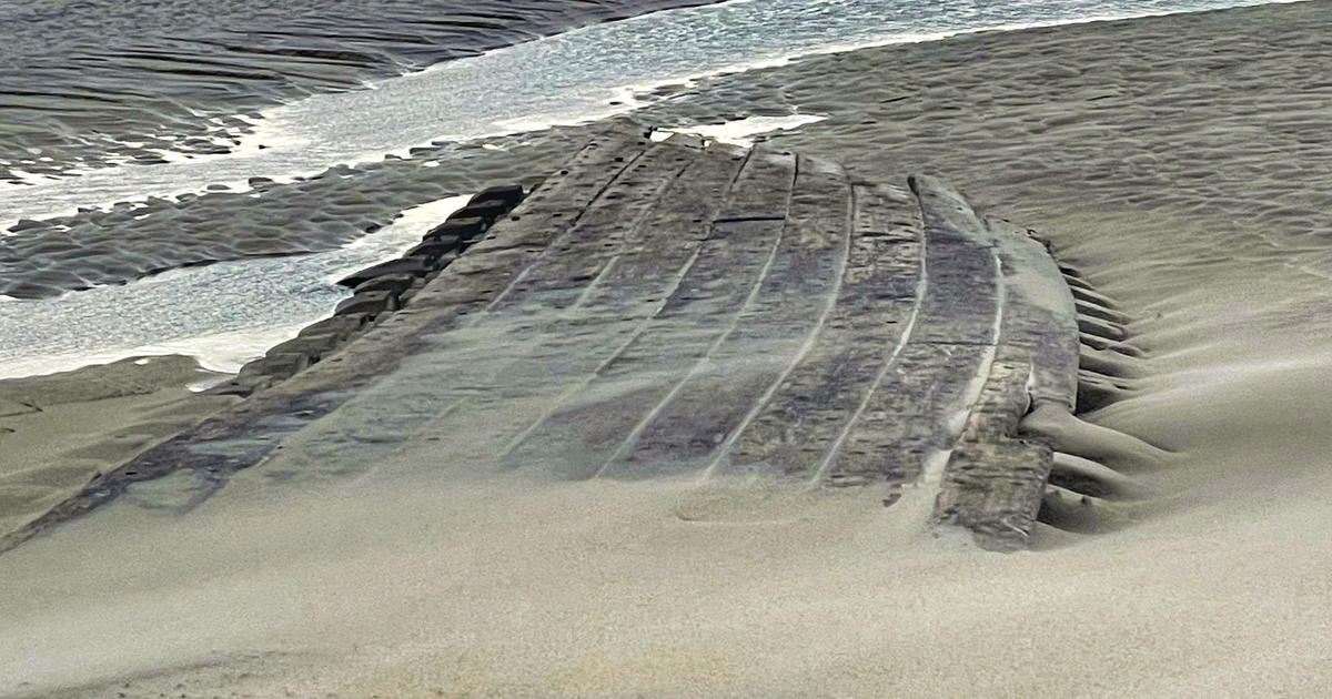 Large piece of century-old shipwreck revealed on Massachusetts beach