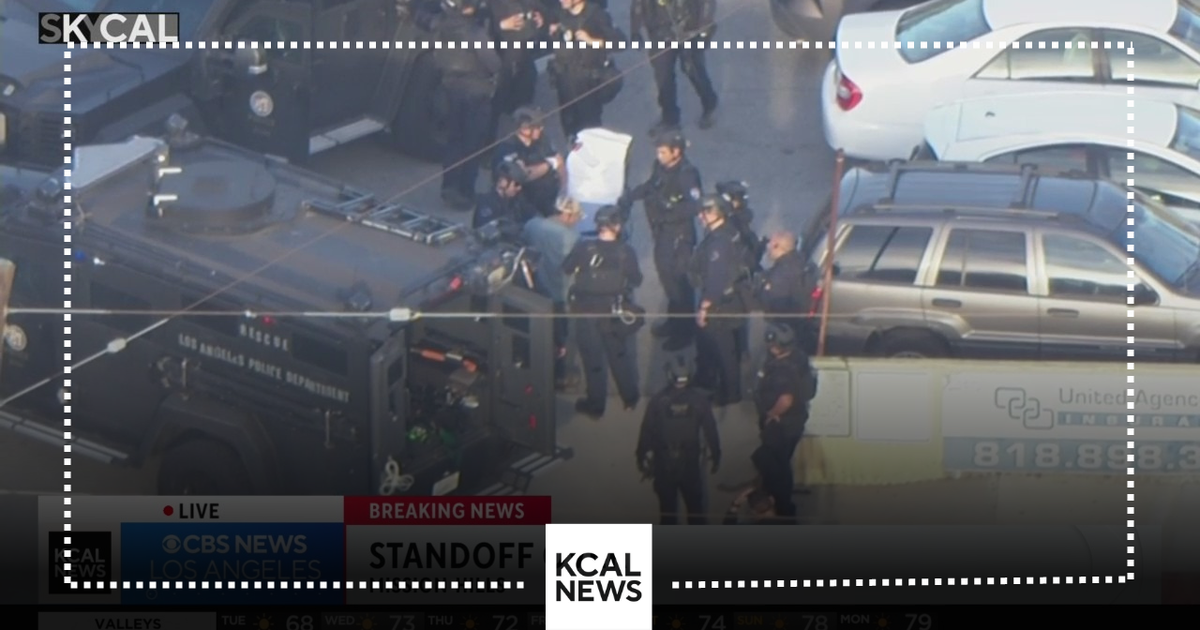 Lengthy standoff with man armed with chainsaw ends with arrest in ...
