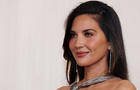 Olivia Munn poses on the red carpet during the Oscars arrivals at the Academy Awards in Hollywood, Los Angeles, California, March 10, 2024. 
