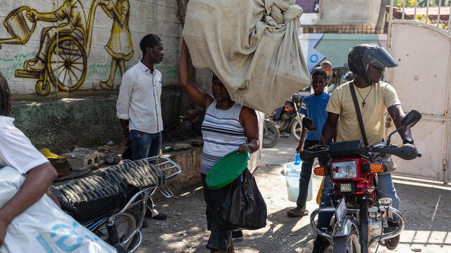 Haitians in the capital Port-au-Prince forced to flee their homes amid spiraling gang violence 
