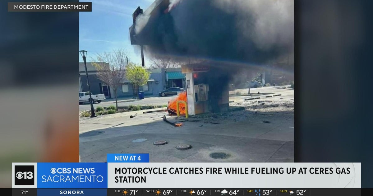 Motorcycle catches fire next to gas pump in Ceres