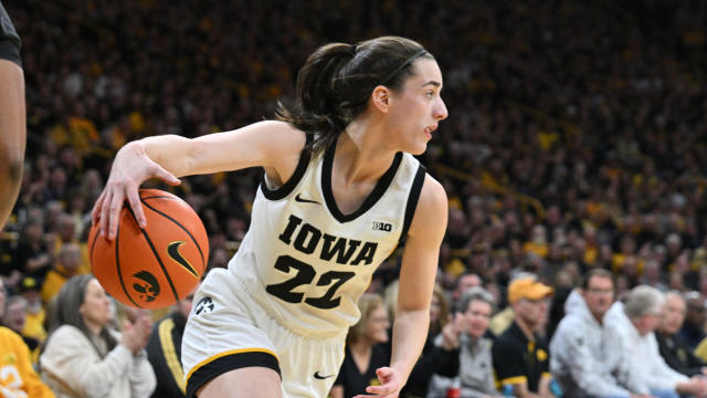 Iowa Hawkeyes guard Caitlin Clark controls the ball during the first quarter against the Ohio State Buckeyes at Carver-Hawkeye Arena in Iowa City, March 3, 2024. 