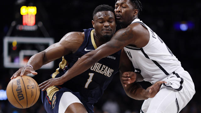 Zion Williamson #1 of the New Orleans Pelicans dribbles against Dorian Finney-Smith #28 of the Brooklyn Nets during the first half at Barclays Center on March 19, 2024 in the Brooklyn borough of New York City. 