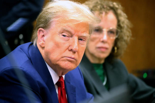 Former President Donald Trump, left, and Susan Necheles, an attorney for Trump, in a courtroom in New York on Monday, March 25, 2024. 