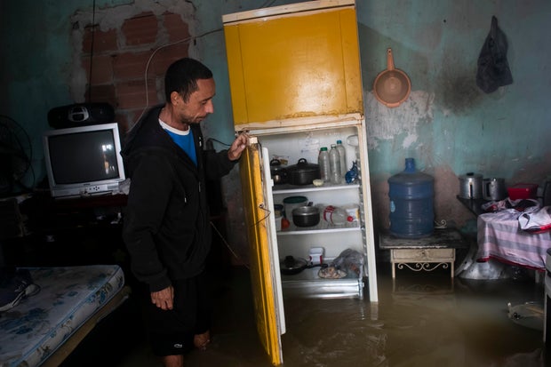 Heavy rains in Brazil kill dozens; girl rescued after more than 16 hours under mud