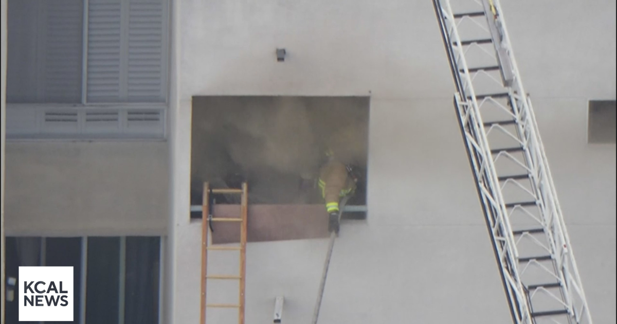 Firefighters rush to extinguish apartment fire in Hollywood - CBS Los ...
