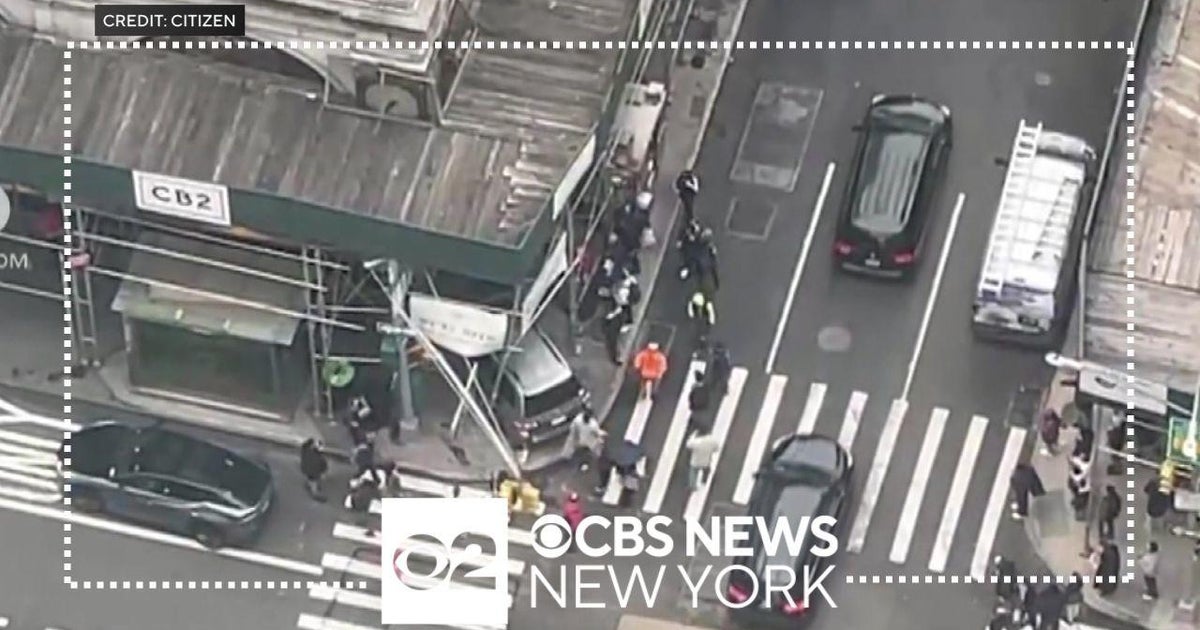 1 hurt in Manhattan after car slams into scaffolding - CBS New York