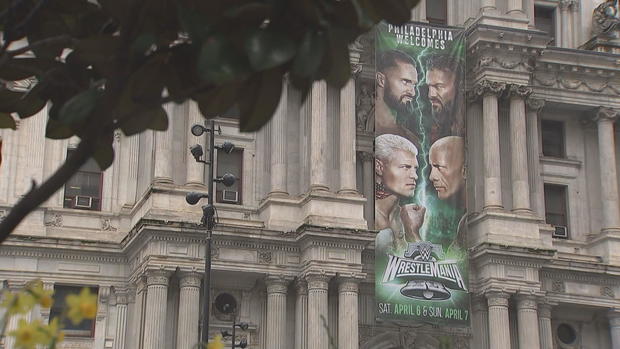 A sign for Wrestlemania hangs near Philadelphia's City Hall 