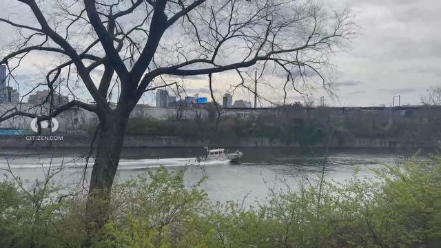 A police boat moves in the Schuylkill River in Philadelphia 