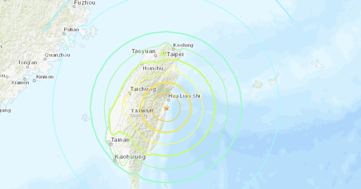 A 7.4-magnitude earthquake strikes an area near Taiwan, shaking the island and triggering tsunami warnings