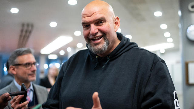 Sen. John Fetterman speaks to reporters about TikTok as he arrives for a vote in the U.S. Capitol on Wednesday, March 20, 2024. 