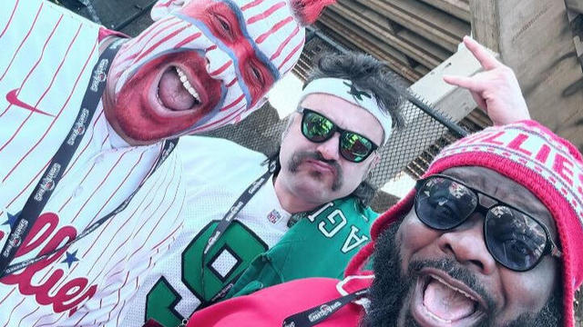 Chris Nady and two friends, all wearing Phillies and Eagles gear 
