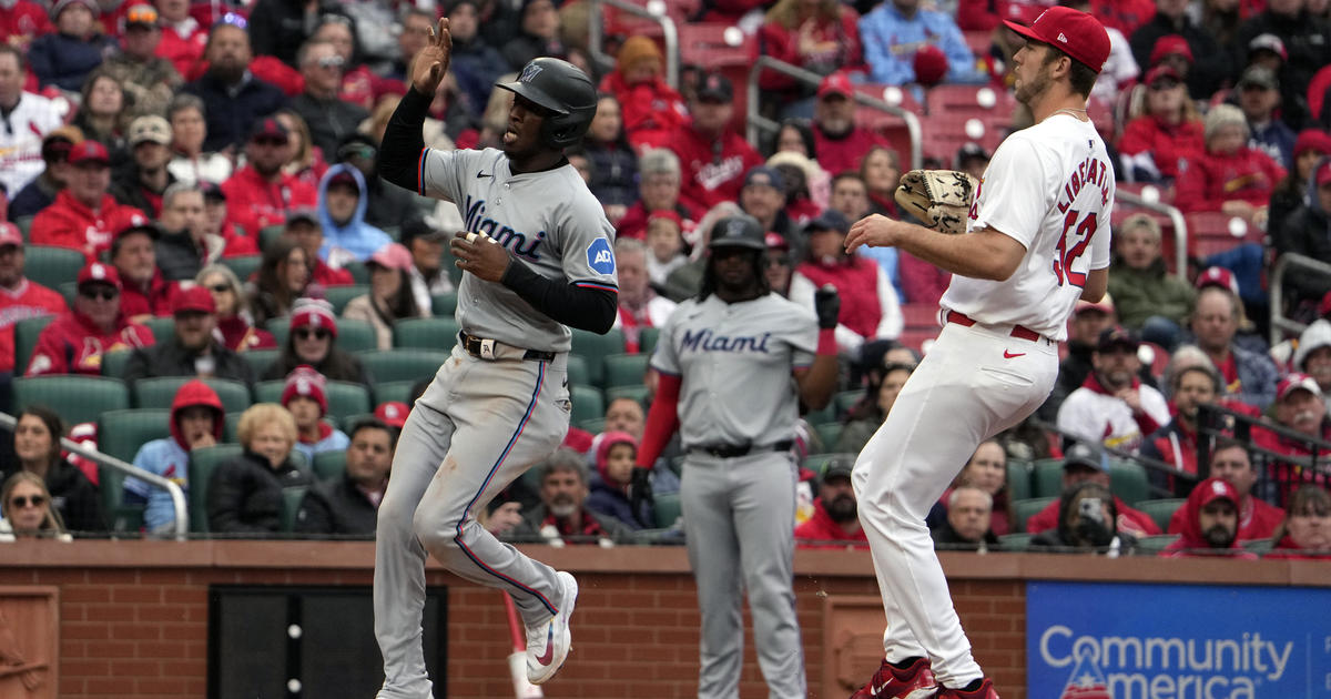 Cardinals acquire property opener, 8-5 more than winless Marlins
