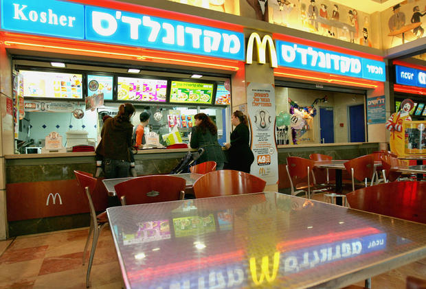 FILE PHOTO: Israeli customers at a McDonald's restaurant in Tel Aviv 