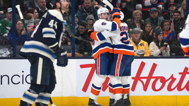Noah Dobson #8 of the New York Islanders celebrates a goal with Alexander Romanov #28 of the New York Islanders during the third period against the Columbus Blue Jackets at Nationwide Arena on April 04, 2024 in Columbus, Ohio. 