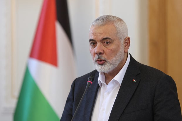 Palestinian group Hamas' top leader, Ismail Haniyeh and Iran's Foreign Minister Hossein Amir Abdollahian attend a press conference in Tehran