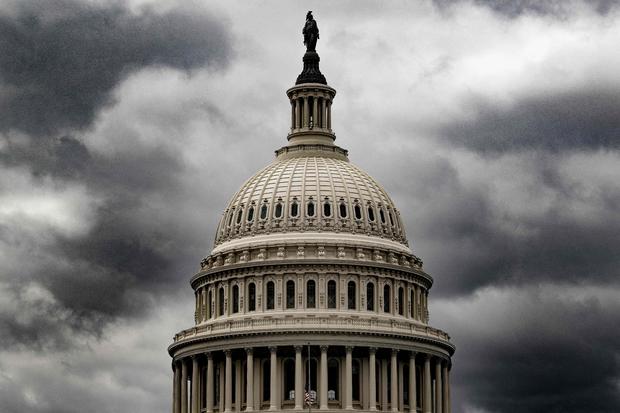 Storm clouds pass over the U.S. Capitol in Washington, D.C., on Jan. 23, 2023. 
