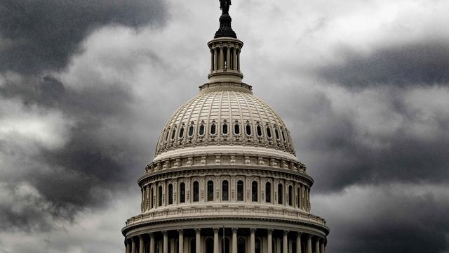 Storm clouds pass over the U.S. Capitol in Washington, DC, on January 23, 2023. 