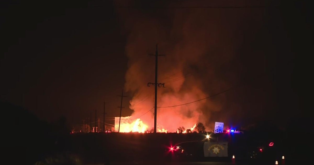 Massive fire at wood pallet facility near Tracy