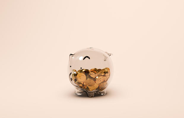 Glass Piggy Bank With Gold Dollar Coins 