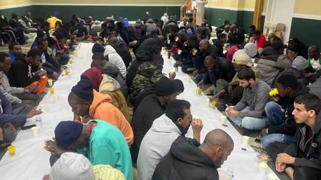 Dozens of people, including migrants, attend a service at a Bronx mosque during Ramadan. 
