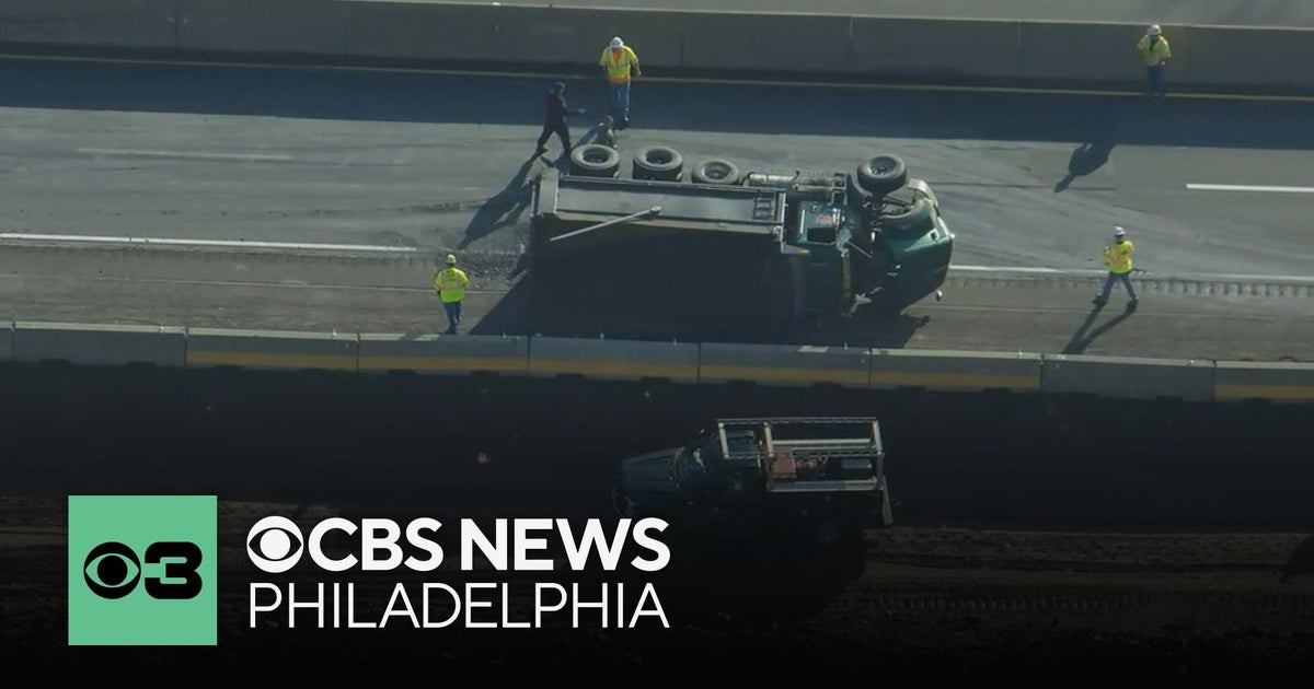 Overturned dump truck closes southbound lanes of Northeast Extension ...