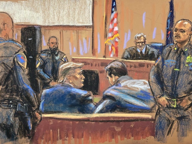 A court sketch shows former President Donald Trump at the defense table on the first day of his criminal trial in New York on Monday, April 15, 2024.