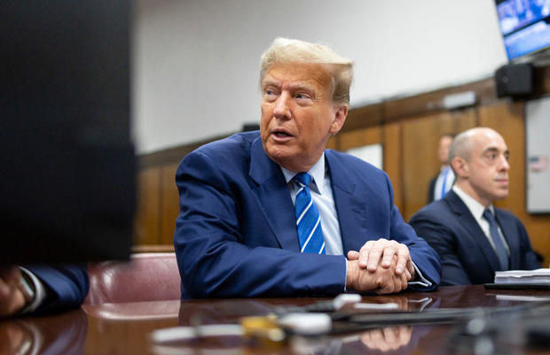Former President Donald Trump sits in the courtroom as he awaits the start of the second day of his criminal trial at Manhattan Criminal Court on April 16, 2024. 