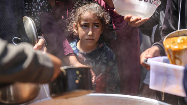 Palestinians Receive Food Rations 