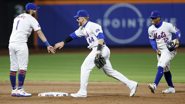 Jeff McNeil #1, Harrison Bader #44, and Francisco Lindor #12 of the New York Mets celebrate after the ninth inning against the Pittsburgh Pirates at Citi Field on April 16, 2024 in the Queens borough of New York City. The Mets won 3-1. 