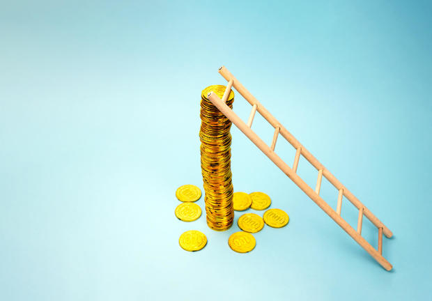Ladder and Stack Of Coins 