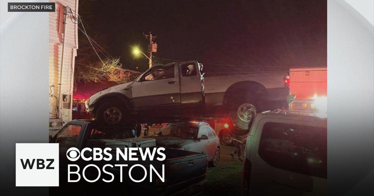 Driver flees after pickup truck lands on parked cars in Brockton – CBS Boston
