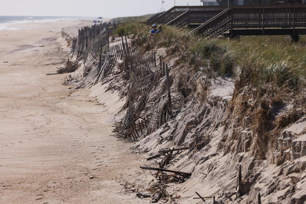 Erosion on the sand dune from Atlantic Ocean on Fire Island, New York 