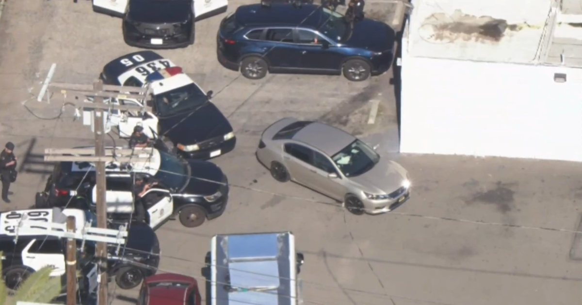 Suspect in stolen vehicle barricaded in car after brief chase in San Pedro