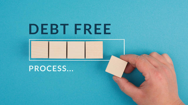 Debt free in process are standing next to the loading bar, ending credit payments and bank loans, financial freedom 