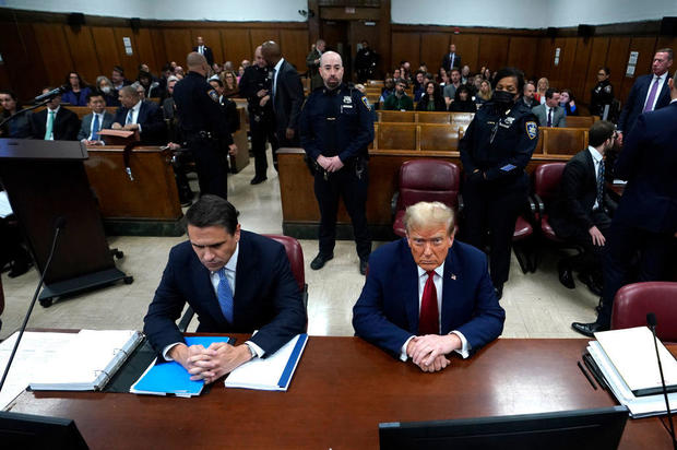 Former President Donald Trump and lawyer Todd Blanche appear in court for Trump's trial at Manhattan Criminal Court on April 23, 2024. 