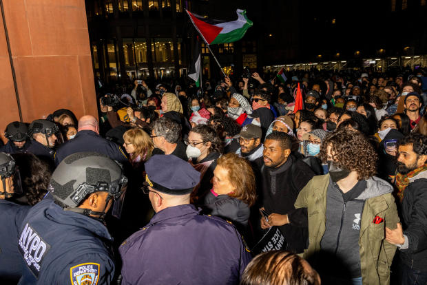 NYPD officers detain protesters at New York University 