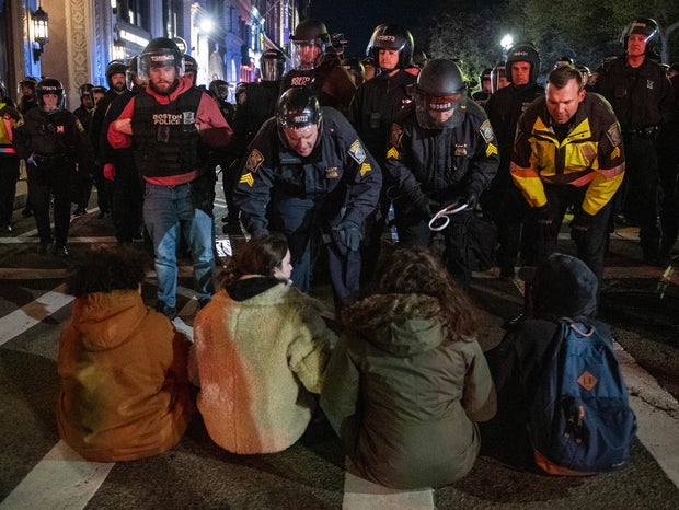 Police move in to arrest pro-Palestinian supporters who were blocking the road after the Emerson College protest camp was cleared by police in Boston, Massachusetts, April 25, 2024.