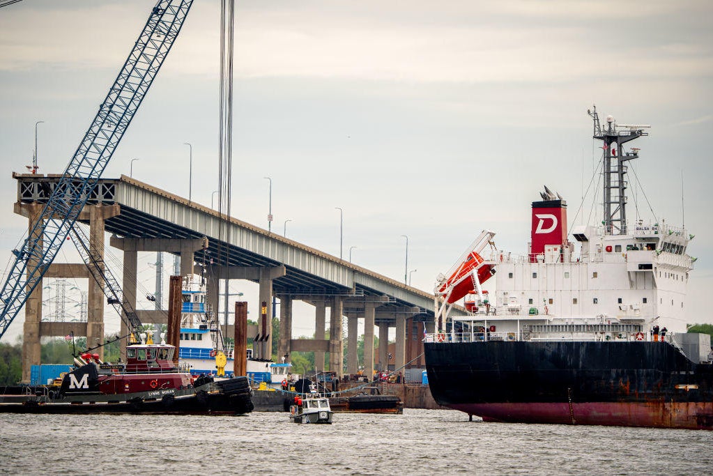 Commercial ships pass Key Bridge wreckage after month stuck in Port of ...