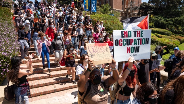 Palestine supporters march at UCLA with faculty 