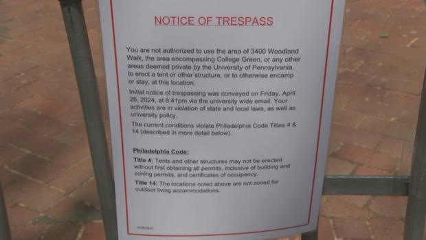 A notice of trespass citing University of Pennsylvania and Philadelphia city codes posted near the Penn encampment. 
