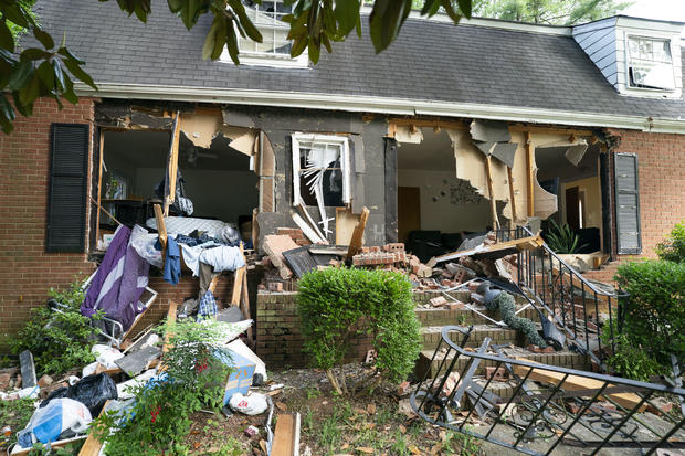 The house where eight law enforcement officers were shot while serving a warrant for possession of a firearm by a felon is seen a day later on April 30, 2024, in Charlotte, North Carolina. 
