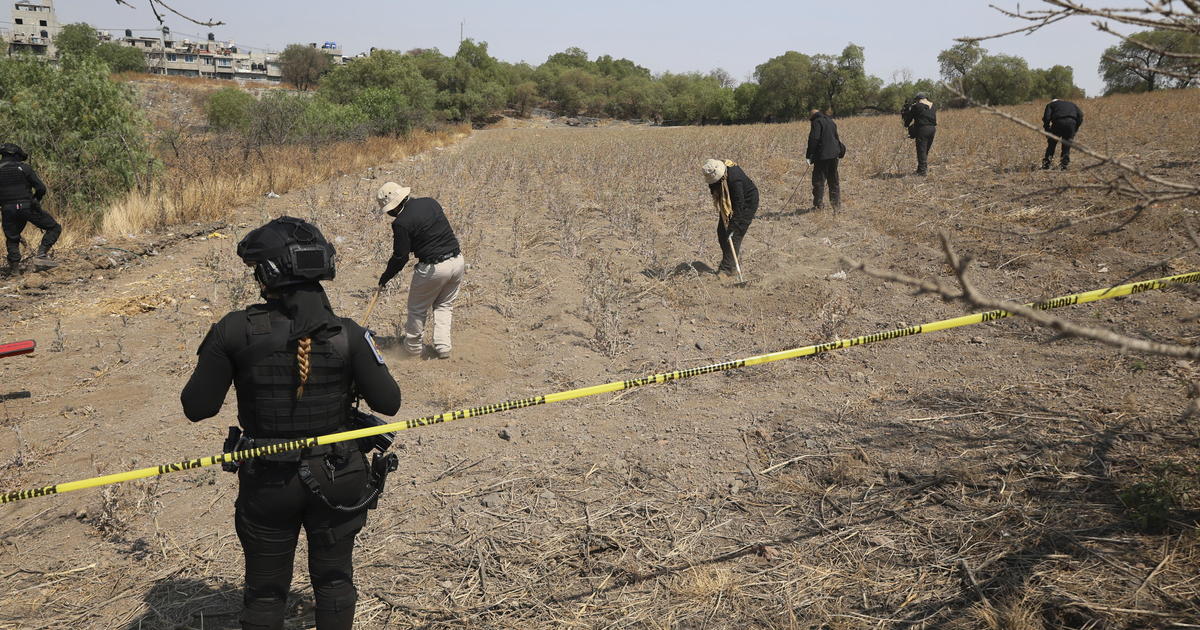 Clandestine burial pits, bones and children's notebooks found in Mexico City, searchers say