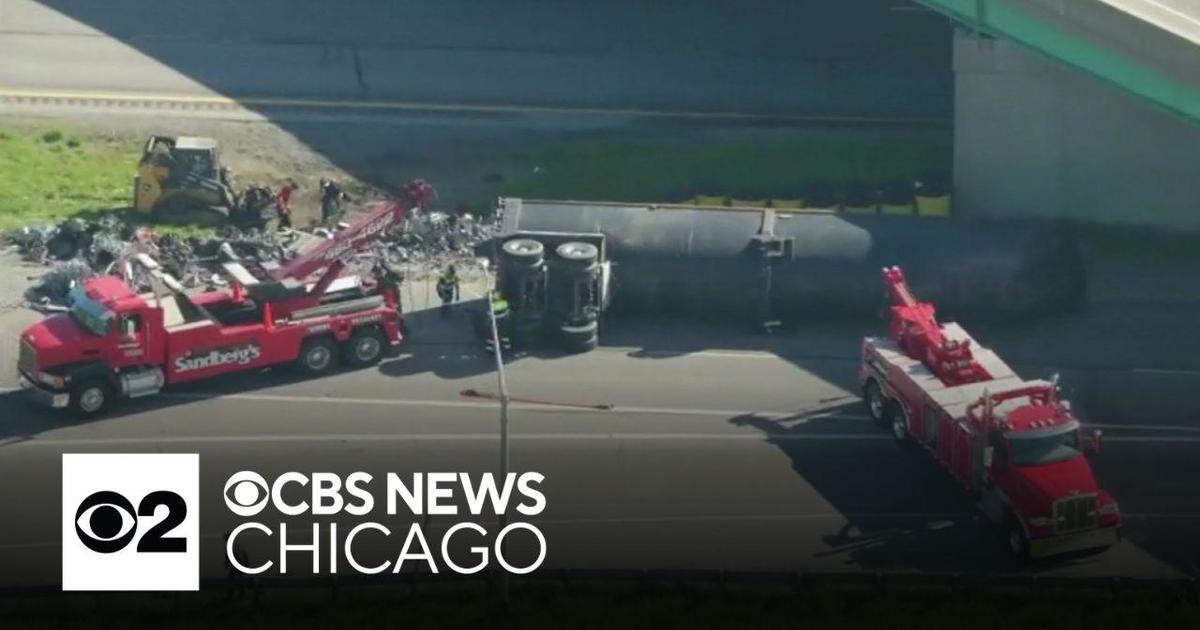 Overturned truck spills scrap metal, blocks Indiana highway – CBS News