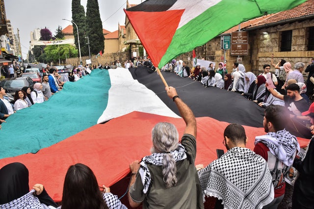 Students take part in a pro-Palestinian demonstration at the American University of Beirut, April 30, 2024, amid the ongoing conflict between Israel and the militant group Hamas in Gaza. 