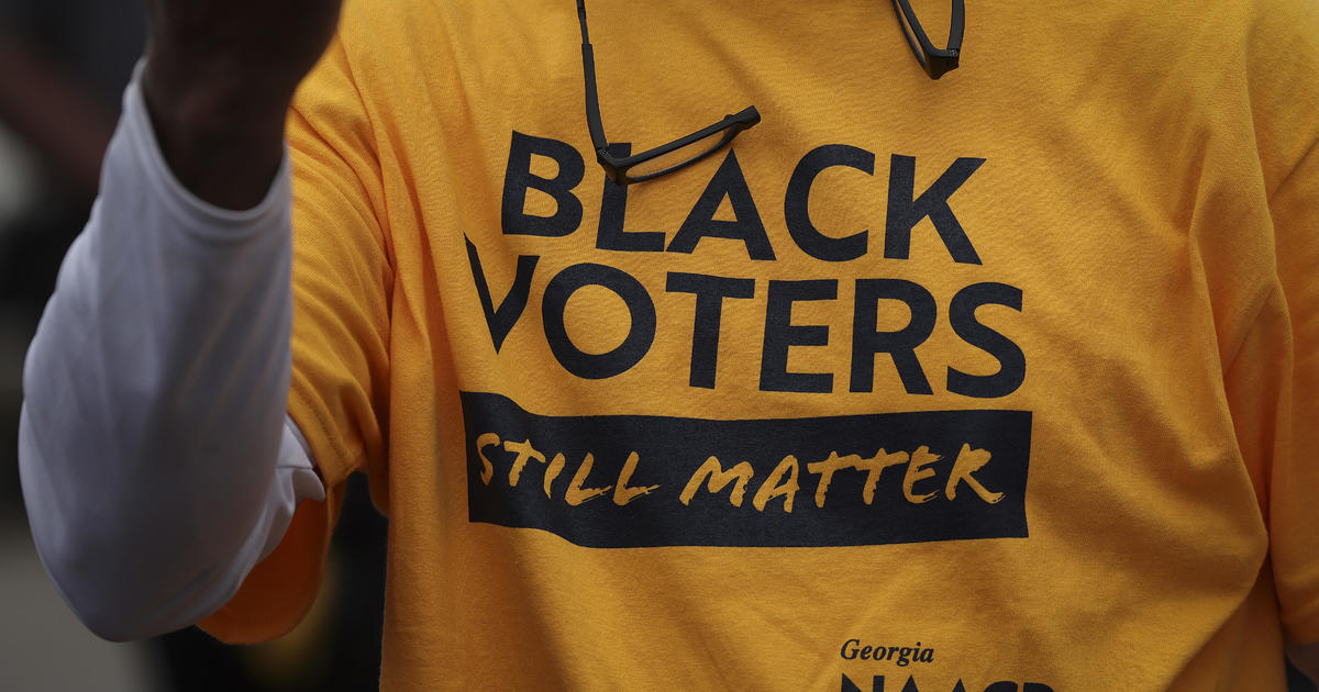 Джеймс Бътлър, чернокож, 42-годишен демократ от Атланта, планира да гласува
