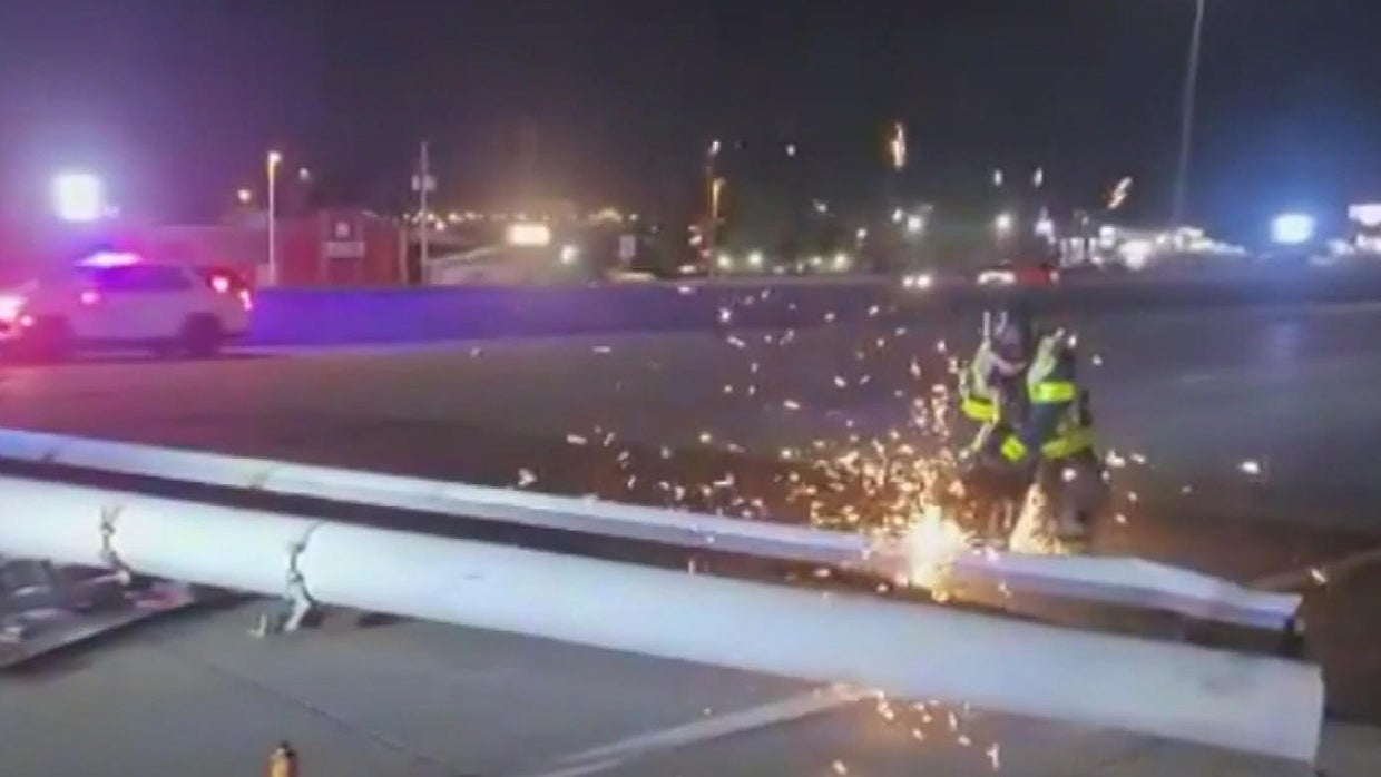Strong winds knock down signpost, back up traffic before I-25 reopened ...