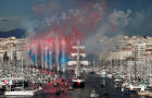 The Belem, a three-masted sailing ship carrying the Olympic flame, arrives at Marseille's Old Port in France ahead of the 2024 Paris Olympics, May 8, 2024. 
