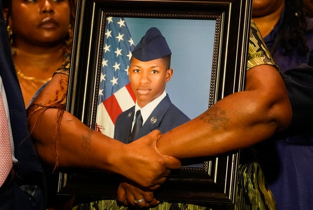 Chantemekki Fortson, mother of U.S. Air Force Senior Airman Roger Fortson, holds a photo of her son during a news conference about his death, along with family and attorney Ben Crump, on May 9, 2024, in Fort Walton Beach, Florida.